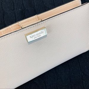 NWOT Kate Spade soft pink slim leather wallet.
